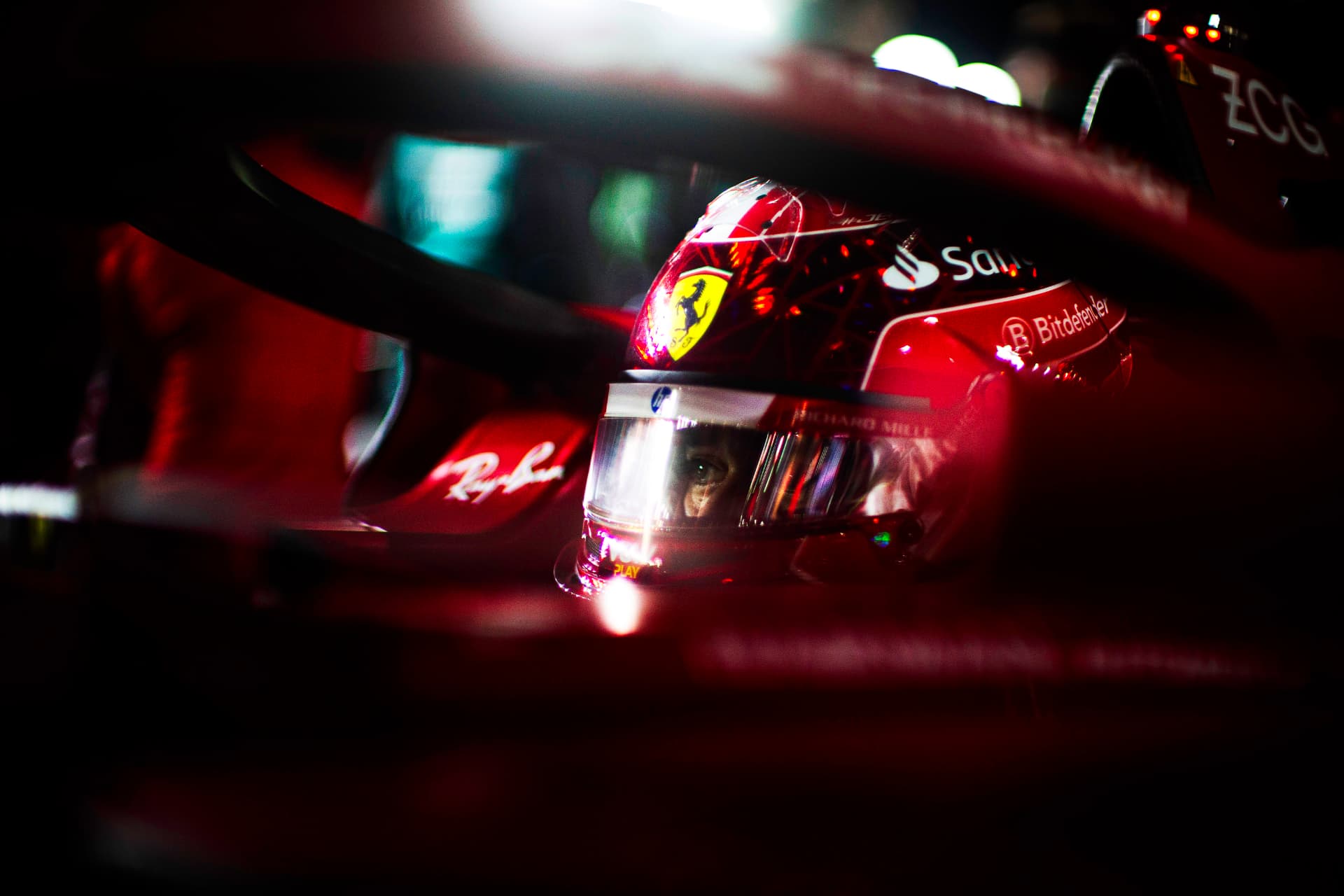 Charles Leclerc in the Ferrari cockpit under the Singapore lights